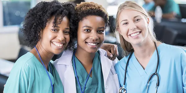 Nursing MSN student providing patient care in a clinical training environment