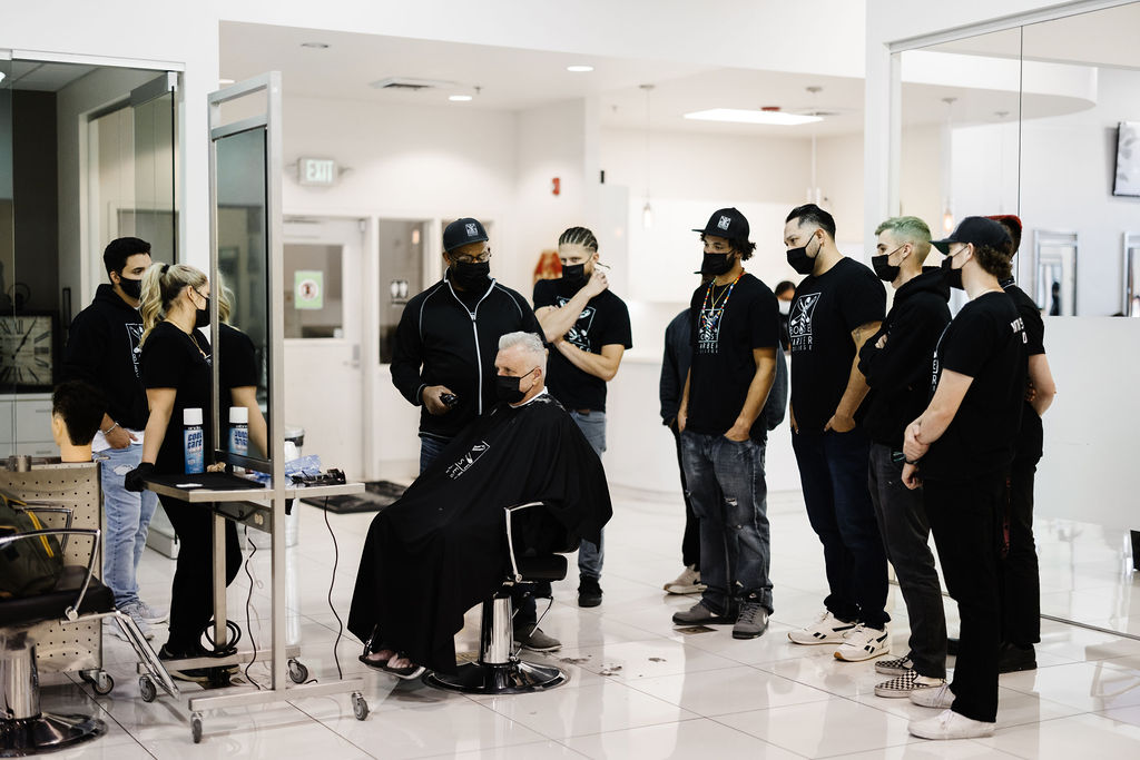 Instructor demonstrating to a group of students